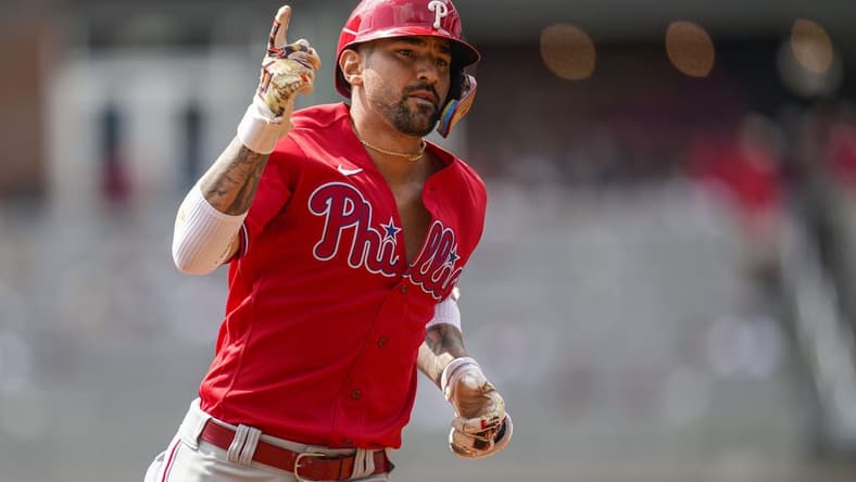Sep 20, 2023; Cumberland, Georgia, USA; Philadelphia Phillies right fielder Nick Castellanos (8) reacts after hitting a home run against the Atlanta Braves during the second inning  at Truist Park. Mandatory Credit: Dale Zanine-USA TODAY Sports