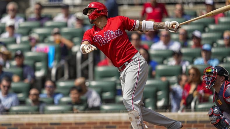 Sep 20, 2023; Cumberland, Georgia, USA; Philadelphia Phillies right fielder Nick Castellanos (8) hits a home run against the Atlanta Braves during the second inning at Truist Park. Mandatory Credit: Dale Zanine-USA TODAY Sports