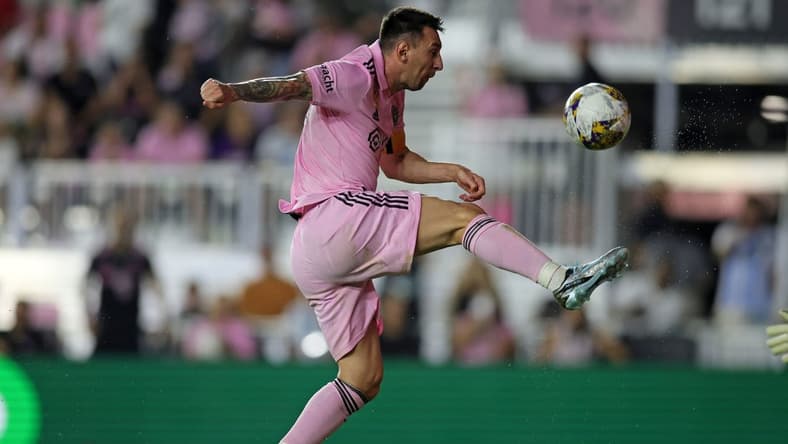 Sep 20, 2023; Fort Lauderdale, Florida, USA; Inter Miami forward Lionel Messi (10) kicks the ball against the Toronto FC during the first half at DRV PNK Stadium. Mandatory Credit: Sam Navarro-USA TODAY Sports
