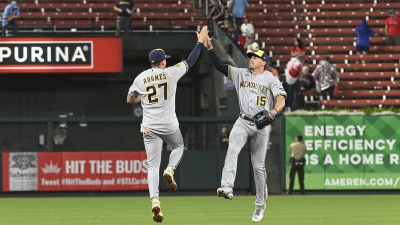 Sep 20, 2023; St. Louis, Missouri, USA; Milwaukee Brewers left fielder Tyrone Taylor (15) celebrates with shortstop Willy Adames (27) after defeating the St. Louis Cardinals at Busch Stadium. Mandatory Credit: Jeff Le-USA TODAY Sports