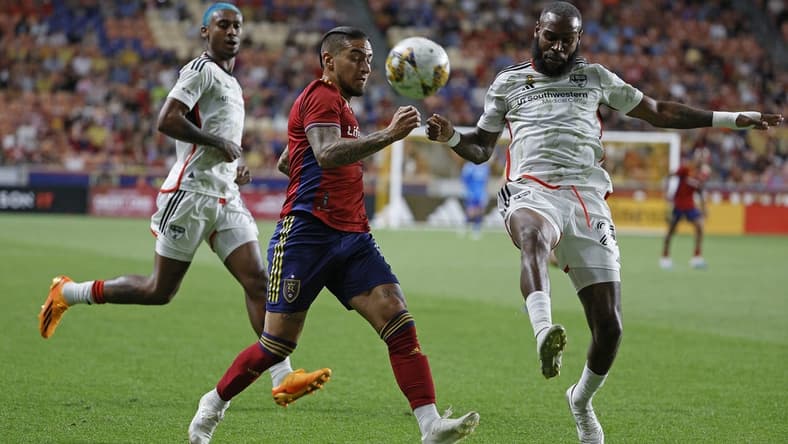 Sep 20, 2023; Sandy, Utah, USA; FC Dallas defender Sebastien Ibeagha (25) clears the ball from Real Salt Lake forward Chicho Arango (9) in the first half at America First Field. Mandatory Credit: Jeff Swinger-USA TODAY Sports