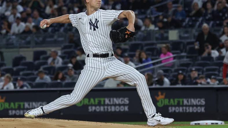 Sep 22, 2023; Bronx, New York, USA; New York Yankees starting pitcher Luke Weaver (30) delivers a pitch during the first inning against the Arizona Diamondbacks at Yankee Stadium. Mandatory Credit: Vincent Carchietta-USA TODAY Sports