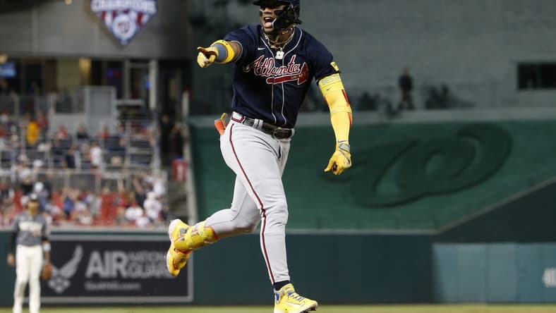 Sep 22, 2023; Washington, District of Columbia, USA; Atlanta Braves right fielder Ronald Acuna Jr. (13) celebrates while rounding the bases after hitting his 40th home run of the season against the Washington Nationals during the first inning at Nationals Park. Mandatory Credit: Amber Searls-USA TODAY Sports