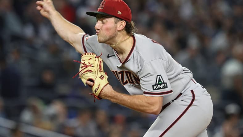 Sep 22, 2023; Bronx, New York, USA; Arizona Diamondbacks starting pitcher Brandon Pfaadt (32) delivers a pitch during the third inning against the New York Yankees at Yankee Stadium. Mandatory Credit: Vincent Carchietta-USA TODAY Sports