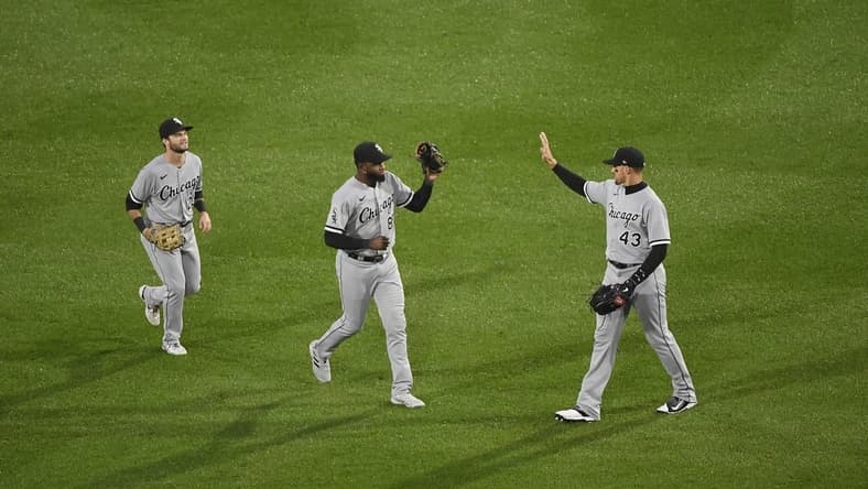Sep 23, 2023; Boston, Massachusetts, USA;  Chicago White Sox center fielder Trayce Thompson (43) high fives center fielder Luis Robert Jr. (88) after defeating the Boston Red Sox at Fenway Park. Mandatory Credit: Bob DeChiara-USA TODAY Sports