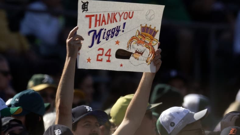 Sep 23, 2023; Oakland, California, USA; A fan holds up a sign acknowledging Detroit Tigers designated hitter Miguel Cabrera during the eighth inning against the Oakland Athletics at Oakland-Alameda County Coliseum. Cabrera is retiring after 21 Major League seasons. Mandatory Credit: D. Ross Cameron-USA TODAY Sports