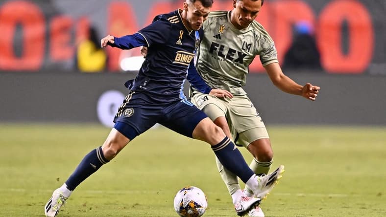 Sep 23, 2023; Philadelphia, Pennsylvania, USA; Philadelphia Union midfielder Deniel Gazdag (10) battles for the ball against Los Angeles FC defender Denil Maldonado (2) during the first half at Subaru Park. Mandatory Credit: Kyle Ross-USA TODAY Sports