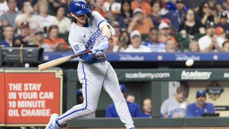 Sep 23, 2023; Houston, Texas, USA; Kansas City Royals shortstop Bobby Witt Jr. (7) hits a single against the Houston Astros in the fifth inning at Minute Maid Park. Mandatory Credit: Thomas Shea-USA TODAY Sports