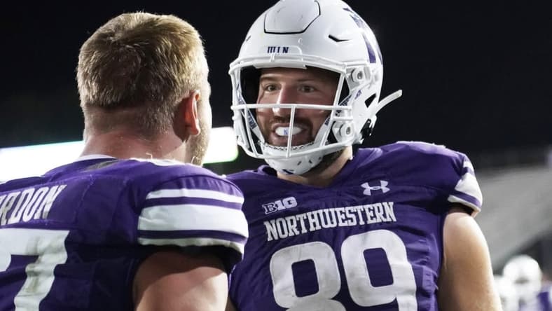 Sep 23, 2023; Evanston, Illinois, USA; Northwestern Wildcats tight end Charlie Mangieri (89) celebrates his game winning touchdown in overtime against the Minnesota Golden Gophers during the second half at Ryan Field. Mandatory Credit: David Banks-USA TODAY Sports