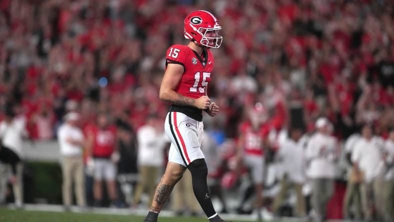 Sep 23, 2023; Athens, Georgia, USA; Georgia Bulldogs quarterback Carson Beck (15) reacts after a touchdown against the UAB Blazers in the second half at Sanford Stadium. Mandatory Credit: Kirby Lee-USA TODAY Sports