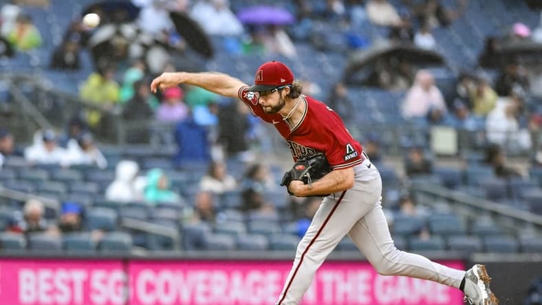 Sep 24, 2023; Bronx, New York, USA; Arizona Diamondbacks starting pitcher Zac Gallen (23) pitches against the New York Yankees during the first inning at Yankee Stadium. Mandatory Credit: John Jones-USA TODAY Sports
