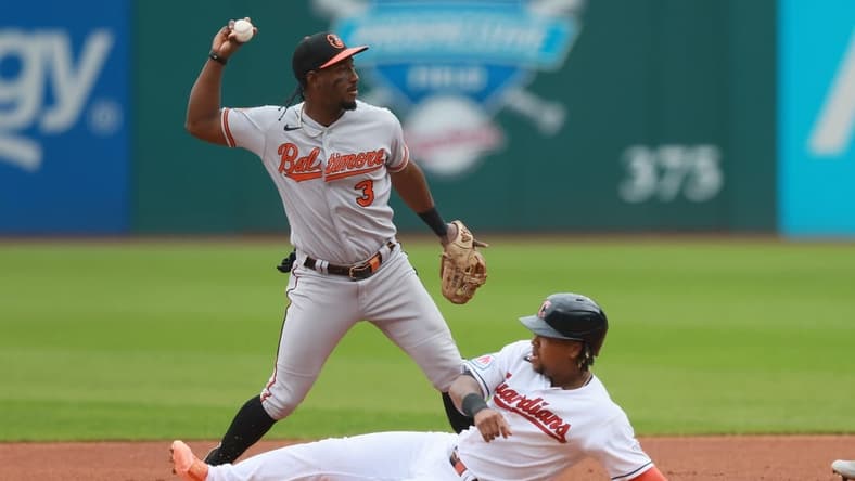 Sep 24, 2023; Cleveland, Ohio, USA; Baltimore Orioles shortstop Jorge Mateo (3) throws to first to complete a double play after forcing out Cleveland Guardians third baseman Jose Ramirez (11) during the first inning at Progressive Field. Mandatory Credit: Aaron Josefczyk-USA TODAY Sports