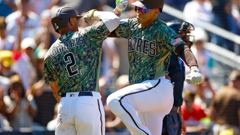 Sep 24, 2023; San Diego, California, USA; San Diego Padres left fielder Juan Soto (22) celebrates with San Diego Padres designated hitter Xander Bogaerts (2) after hitting a three run home run in the first inning against the St. Louis Cardinals at Petco Park. Mandatory Credit: David Frerker-USA TODAY Sports