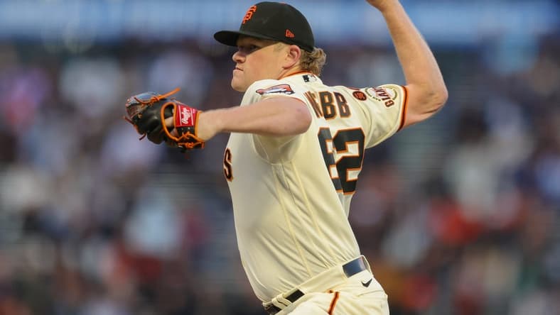Sep 25, 2023; San Francisco, California, USA; San Francisco Giants starting pitcher Logan Webb (62) pitches during the first inning against the San Diego Padres at Oracle Park. Mandatory Credit: Sergio Estrada-USA TODAY Sports