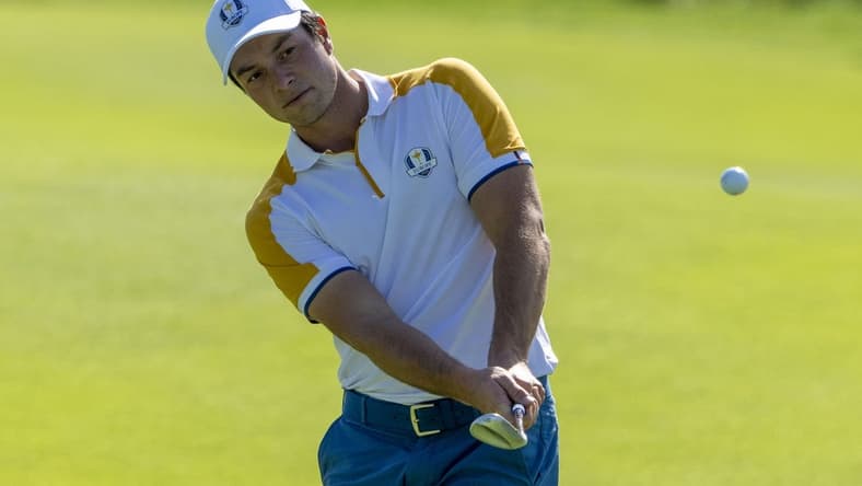 September 26, 2023; Rome, ITALY; Team Europe golfer Viktor Hovland hits his chip shot on the second hole during a practice round of the Ryder Cup golf competition at Marco Simone Golf and Country Club. Mandatory Credit: Kyle Terada-USA TODAY Sports