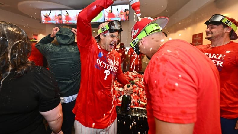 Sep 26, 2023; Philadelphia, Pennsylvania, USA; The Philadelphia Phillies celebrate in the locker room after the game against the Pittsburgh Pirates at Citizens Bank Park. Mandatory Credit: Kyle Ross-USA TODAY Sports