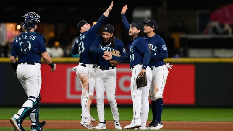 Sep 26, 2023; Seattle, Washington, USA; The Seattle Mariners celebrate defeating the Houston Astros at T-Mobile Park. Mandatory Credit: Steven Bisig-USA TODAY Sports