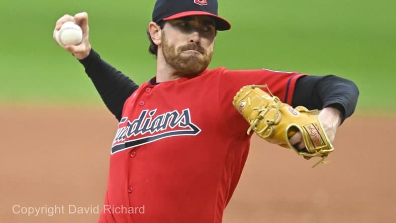 Sep 27, 2023; Cleveland, Ohio, USA; Cleveland Guardians starting pitcher Shane Bieber (57) delivers a pitch in the first inning against the Cincinnati Reds at Progressive Field. Mandatory Credit: David Richard-USA TODAY Sports