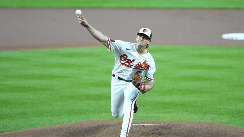 Sep 28, 2023; Baltimore, Maryland, USA; Baltimore Orioles pitcher Dean Kremer (64) delivers a pitch against the Boston Red Sox during the first inning at Oriole Park at Camden Yards. Mandatory Credit: Gregory Fisher-USA TODAY Sports