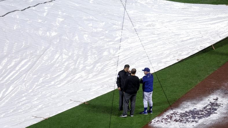 Sep 28, 2023; New York City, New York, USA; New York Mets manager Buck Showalter (11) talks to officials during a rain delay during the ninth inning against the Miami Marlins at Citi Field. Mandatory Credit: Brad Penner-USA TODAY Sports