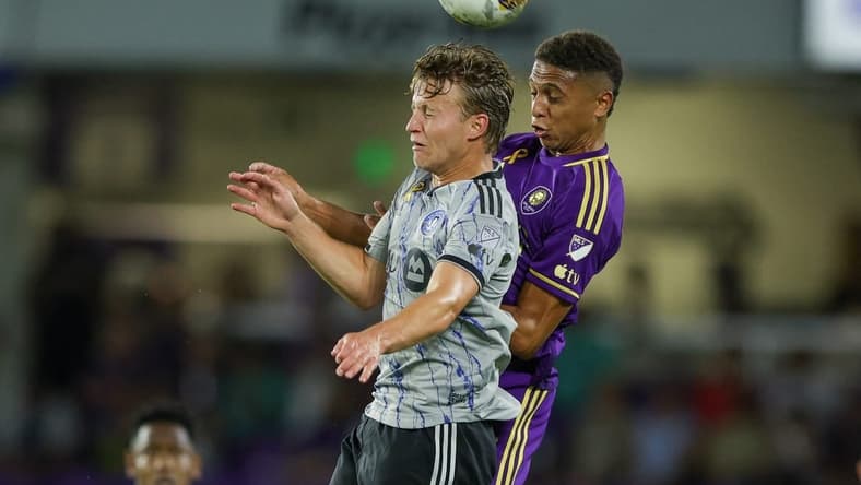 Sep 30, 2023; Orlando, Florida, USA; Orlando City SC defender Rafael Santos (3) and CF Montreal midfielder Bryce Duke (10) battle for a head ball in the first half at Exploria Stadium. Mandatory Credit: Nathan Ray Seebeck-USA TODAY Sports