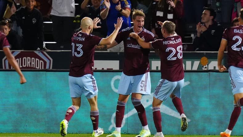 Sep 30, 2023; Commerce City, Colorado, USA; Colorado Rapids defender Andreas Maxs   (5) celebrates his goal with defender Andrew Gutman (13) and midfielder Sam Nicholson (28) in the first half against the Austin FC at Dick's Sporting Goods Park. Mandatory Credit: Ron Chenoy-USA TODAY Sports