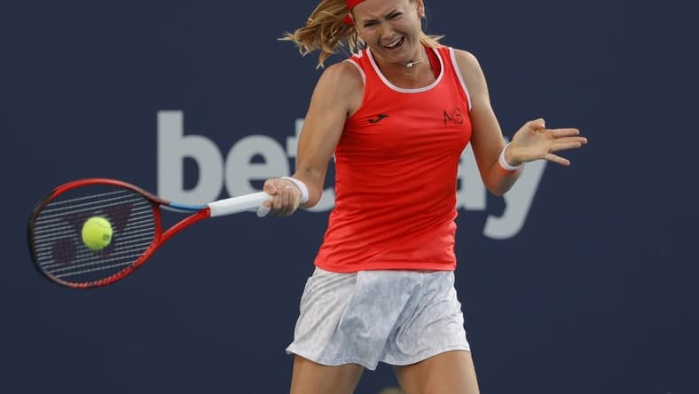 Mar 25, 2022; Miami Gardens, FL, USA; Marie Bouzkova (CZE) hits a forehand against Paula Badosa (ESP) (not pictured) in a second round women's match in the Miami Open at Hard Rock Stadium. Mandatory Credit: Geoff Burke-USA TODAY Sports