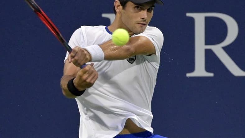 Aug 8, 2022; Montreal, QC, Canada; Marcos Giron (USA) hits a backhand against Roberto Bautista Agut (ESP) (not pictured) in first round play in the National Bank Open at IGA Stadium. Mandatory Credit: Eric Bolte-USA TODAY Sports