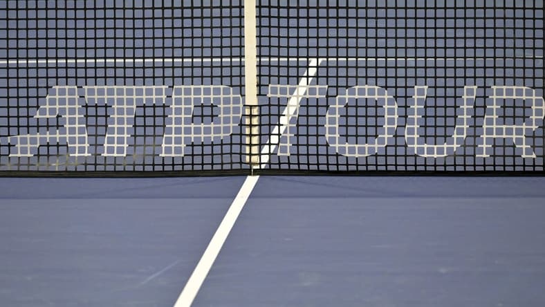 Aug 9, 2022; Montreal, QC, Canada; General view of the net and ATP Tour logo in first round play in the National Bank Open at IGA Stadium. Mandatory Credit: Eric Bolte-USA TODAY Sports