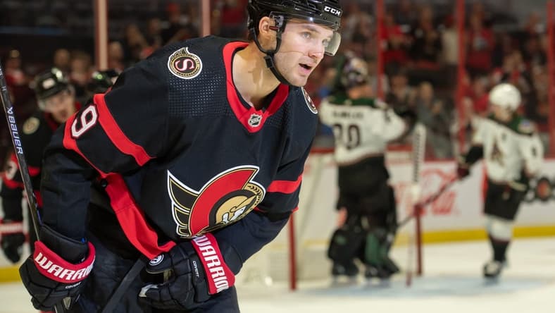 Oct 22, 2022; Ottawa, Ontario, CAN; Ottawa Senators center Josh Norris (9 skates back to the bench after scoring in the first period against the Arizona Coyotes at the Canadian Tire Centre. Mandatory Credit: Marc DesRosiers-USA TODAY Sports