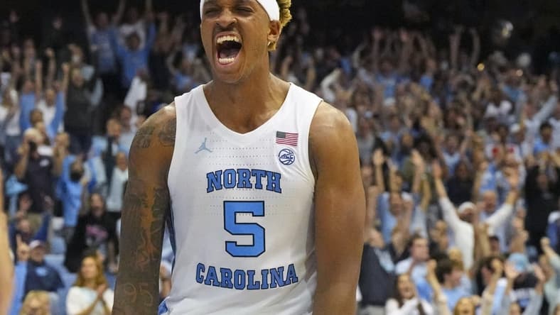 Nov 11, 2022; Chapel Hill, North Carolina, USA;  North Carolina Tar Heels forward Armando Bacot (5) reacts to his dunk against the Charleston Cougars during the second half at Dean E. Smith Center. Mandatory Credit: James Guillory-USA TODAY Sports