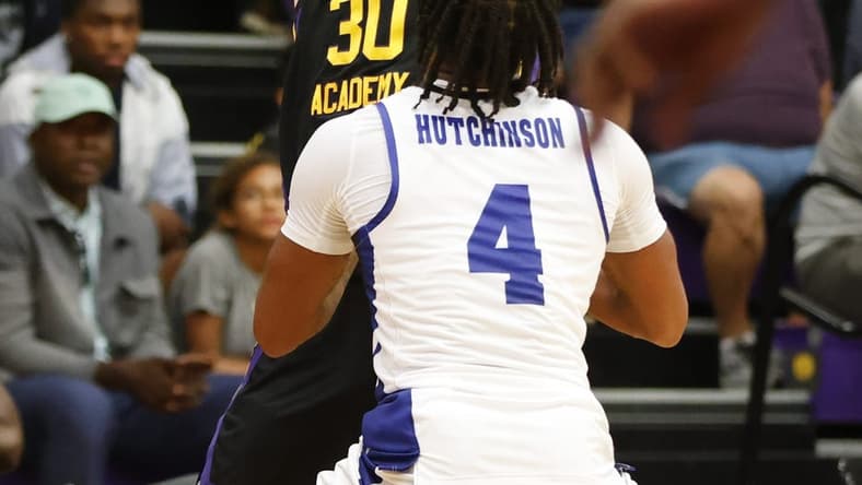 Dec 1, 2022; Montverde, Florida, USA; Montverde Academy guard Liam McNeeley (30) looks to pass the ball over IMG Academy guard Jacoi Hutchinson (4) during the second half of the Sunshine Classic basketball tournament at Mills Championship Court on the campus of Montverde Academy. Mandatory Credit: Reinhold Matay-USA TODAY Sports