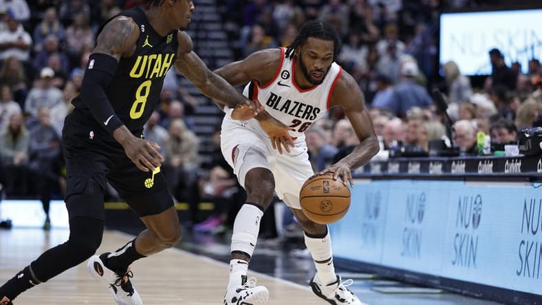 Dec 3, 2022; Salt Lake City, Utah, USA; Utah Jazz forward Jarred Vanderbilt (8) and Portland Trail Blazers forward Justise Winslow (26) battle on in the first quarter at Vivint Arena. Mandatory Credit: Jeffrey Swinger-USA TODAY Sports