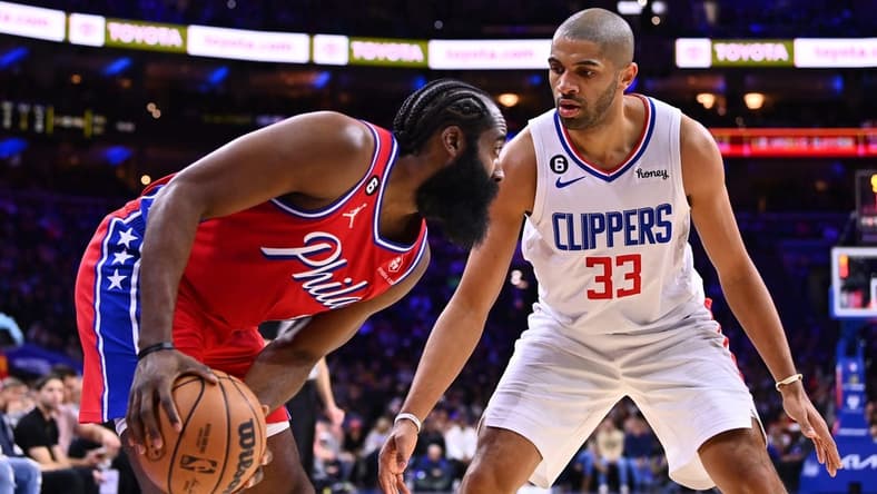 Dec 23, 2022; Philadelphia, Pennsylvania, USA; Los Angeles Clippers guard Nicolas Batum (33) defends Philadelphia 76ers guard James Harden (1) in the second quarter at Wells Fargo Center. Mandatory Credit: Kyle Ross-USA TODAY Sports