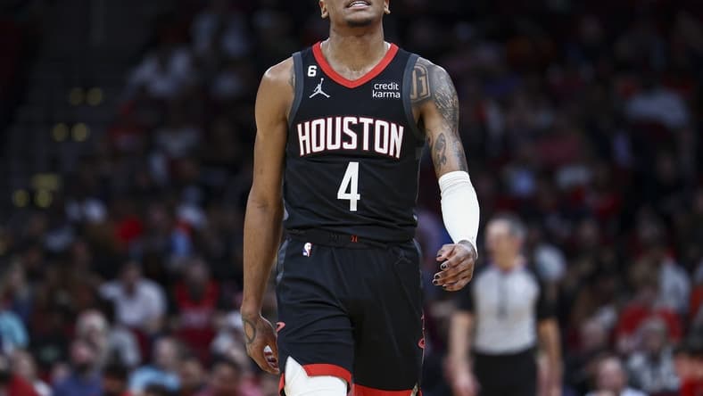 Jan 18, 2023; Houston, Texas, USA; Houston Rockets guard Jalen Green (4) reacts after a play during the third quarter against the Charlotte Hornets at Toyota Center. Mandatory Credit: Troy Taormina-USA TODAY Sports