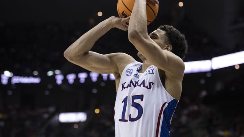 Mar 10, 2023; Kansas City, MO, USA; Kansas Jayhawks guard Kevin McCullar Jr. (15) shoots the ball against the Iowa State Cyclones in the second half at T-Mobile Center. Mandatory Credit: Amy Kontras-USA TODAY Sports