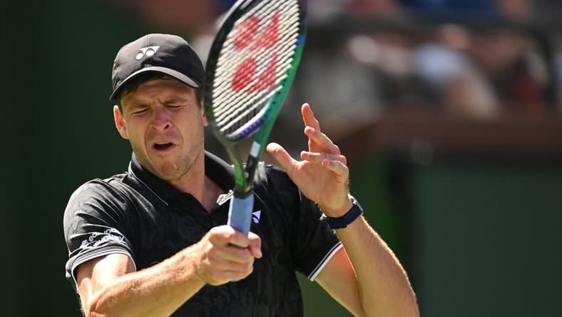 Mar 13, 2023; Indian Wells, CA, USA;  Hubert Hurkacz (POL) hits a shot in his fourth round match against Tommy Paul (USA) during the BNP Paribas Open at the Indian Wells Tennis Garden. Mandatory Credit: Jayne Kamin-Oncea-USA TODAY Sports