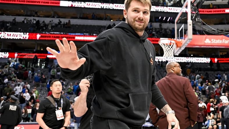 Apr 7, 2023; Dallas, Texas, USA; Dallas Mavericks guard Luka Doncic (77) waves to the crowd as he walks off the court after the Mavericks loss to the Chicago Bulls at the American Airlines Center. Mandatory Credit: Jerome Miron-USA TODAY Sports