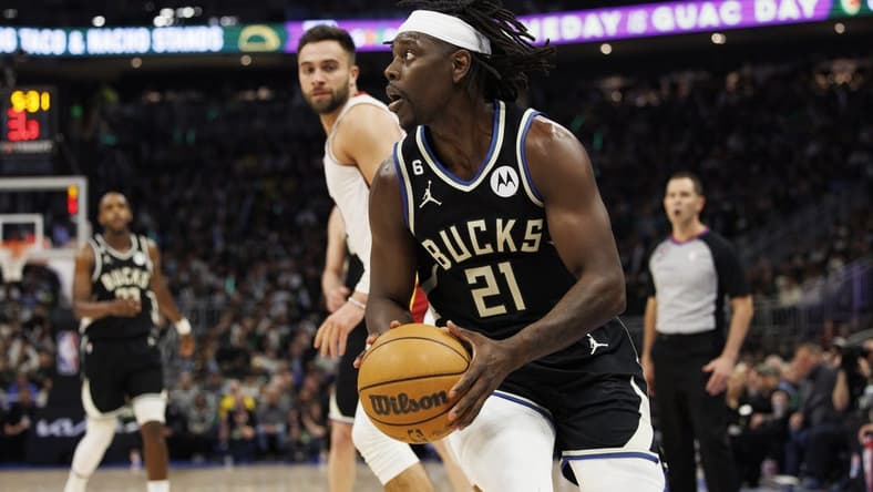 Apr 19, 2023; Milwaukee, Wisconsin, USA; Milwaukee Bucks guard Jrue Holiday (21) looks to shoot during the third quarter against the Miami Heat during game two of the 2023 NBA Playoffs at Fiserv Forum. Mandatory Credit: Jeff Hanisch-USA TODAY Sports