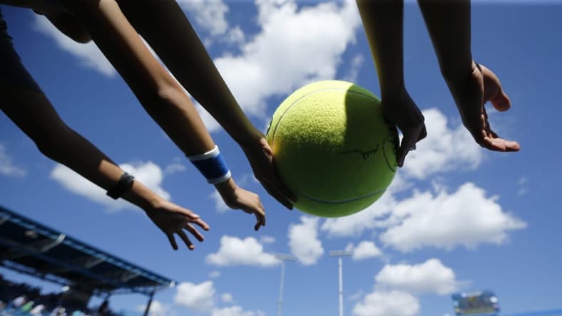 Fans reach out to Rafael Nadal after the ATP tennis match between No. 1-seed Nadal and Albert Ramos-Vinolas during the Western & Southern Open at the Lindner Family Tennis Center in Mason, Ohio, on Friday, Aug. 18, 2017. Nadal won in straight sets, 7-6, 6-2.