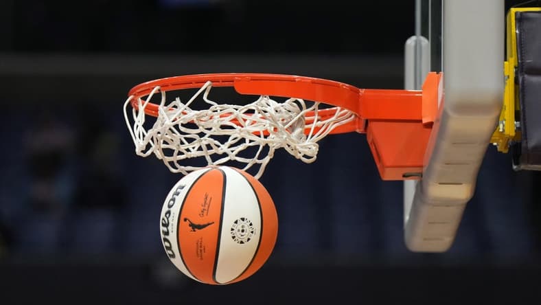 May 25, 2023; Los Angeles, California, USA; Wilson official basketball with WNBA logo goes through the net during the game between the LA Sparks and the Las Vegas Aces at Crypto.com Arena. Mandatory Credit: Kirby Lee-USA TODAY Sports