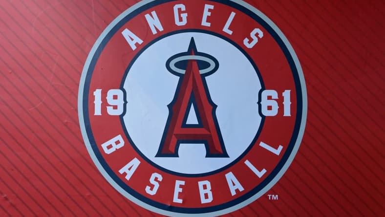Jul 21, 2023; Anaheim, California, USA;  Detailed view of the Los Angeles Angels team logo on the wall of the dugout at Angel Stadium. Mandatory Credit: Jayne Kamin-Oncea-USA TODAY Sports