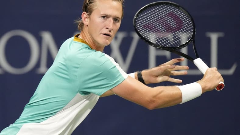 Aug 9, 2023; Toronto, Ontario, Canada; Sebastian Korda (USA) chases a ball hit by Aleksandar Vukic (not pictured) at Sobeys Stadium. Mandatory Credit: John E. Sokolowski-USA TODAY Sports