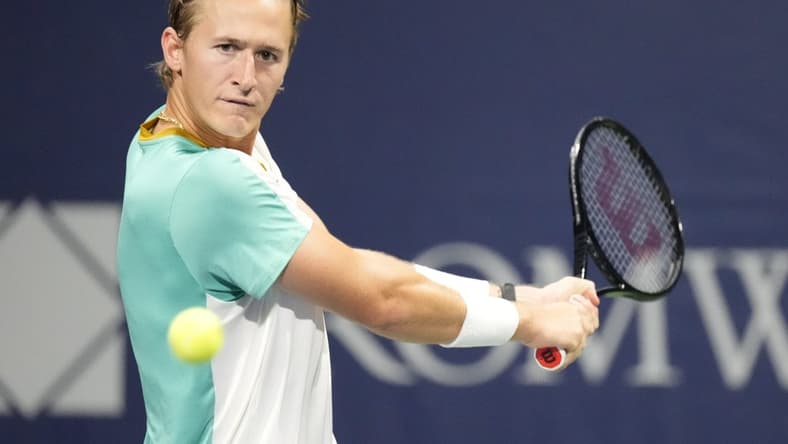 Aug 9, 2023; Toronto, Ontario, Canada; Sebastian Korda (USA) follows a ball hit by Aleksandar Vukic (not pictured) at Sobeys Stadium. Mandatory Credit: John E. Sokolowski-USA TODAY Sports