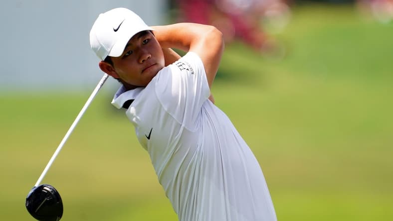 Aug 26, 2023; Atlanta, Georgia, USA; Tom Kim plays his shot from the fourth tee during the third round of the TOUR Championship golf tournament at East Lake Golf Club. Mandatory Credit: John David Mercer-USA TODAY Sports