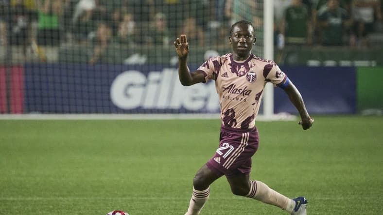 Aug 26, 2023; Portland, Oregon, USA; Portland Timbers midfielder Diego Chara (21) controls the ball during the second half against the Vancouver Whitecaps at Providence Park. Mandatory Credit: Troy Wayrynen-USA TODAY Sports