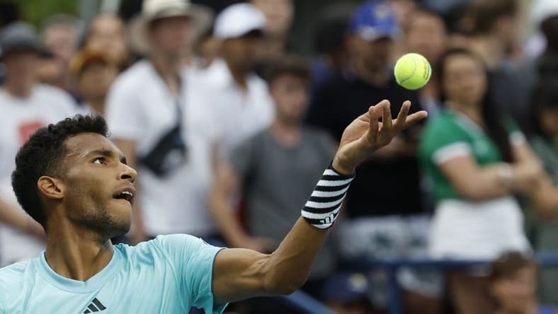 Aug 28, 2023; Flushing, NY, USA; Felix Auger-Aliassime of Canada serves against Mackenzie McDonald of the United States (not pictured) on day one of the 2023 US Open at the Billie Jean King National Tennis Center. Mandatory Credit: Geoff Burke-USA TODAY Sports