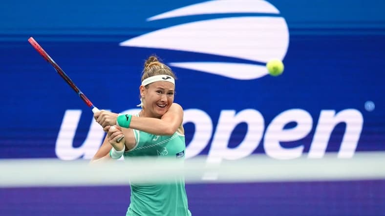 Sep 2, 2023; Flushing, NY, USA; Marie Bouzkova of Czech Republic hits to Ons Jabeur of Tunisia on day six of the 2023 U.S. Open tennis tournament at USTA Billie Jean King National Tennis Center. Mandatory Credit: Danielle Parhizkaran-USA TODAY Sports