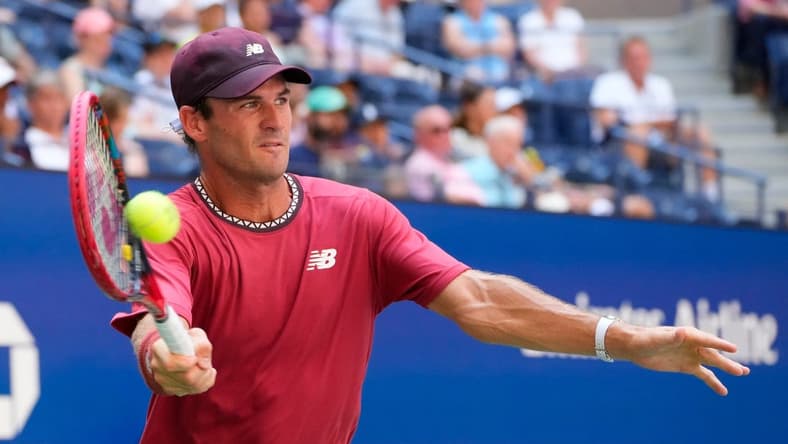 Sept 3, 2023; Flushing, NY, USA; Tommy Paul of the USA hits to Ben Shelton of the USA on day seven of the 2023 U.S. Open tennis tournament at USTA Billie Jean King National Tennis Center. Mandatory Credit: Robert Deutsch-USA TODAY Sports