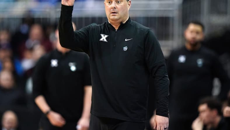 Xavier Musketeers head coach Sean Miller instructs the team during the first half of a Sweet 16 college basketball game between the Xavier Musketeers and the Texas Longhorns in the Midwest Regional of the NCAA Tournament, Friday, March 24, 2023, at T-Mobile Center in Kansas City, Mo.

Ncaa Xavier Texas Ncaa Sweet 16 March 24 0318